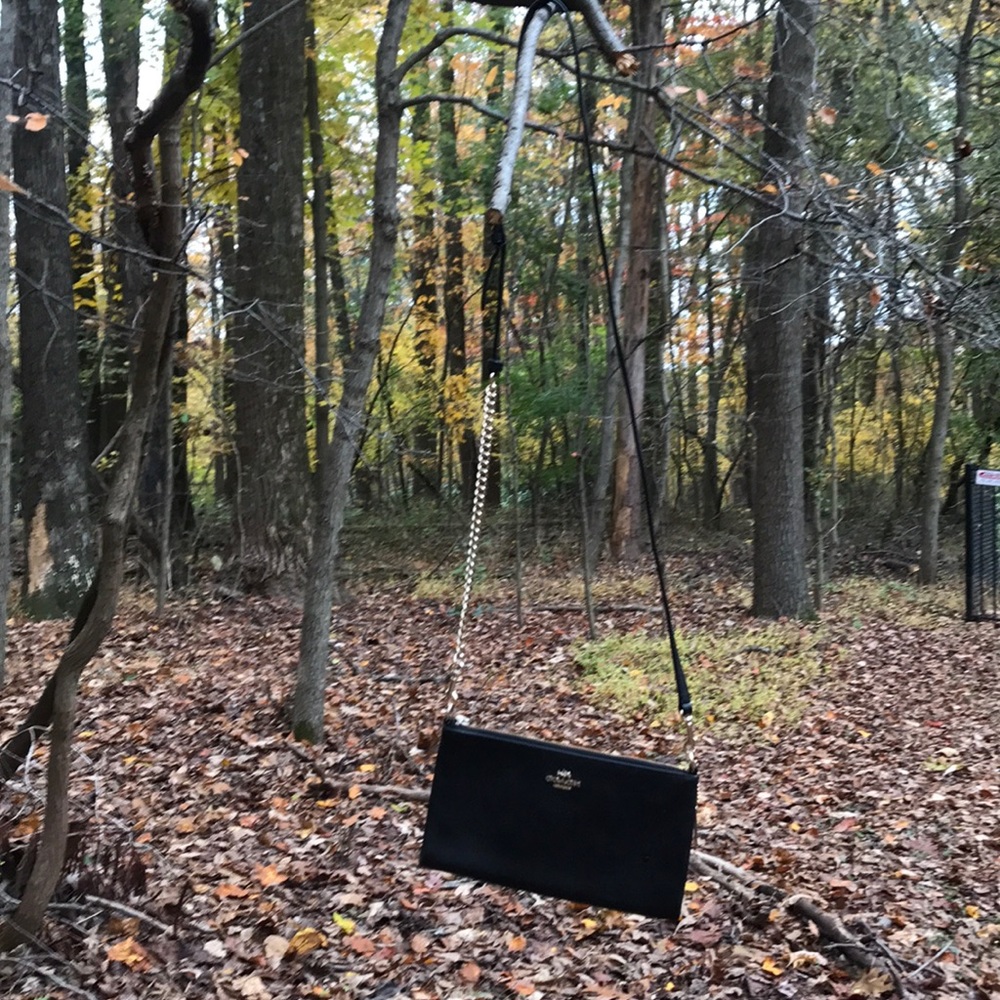 I am selling a black Coach cross body bag